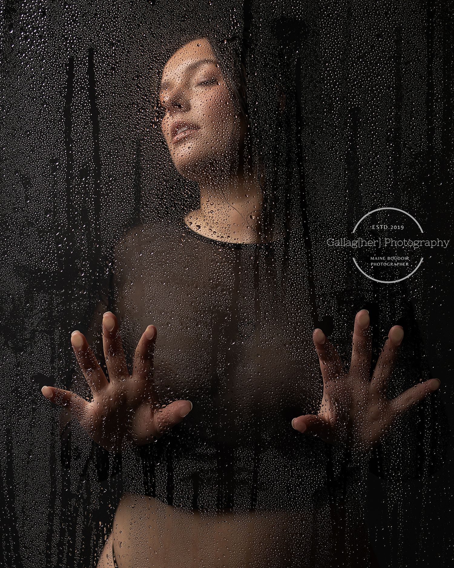 Professional boudoir photo of a woman in the shower