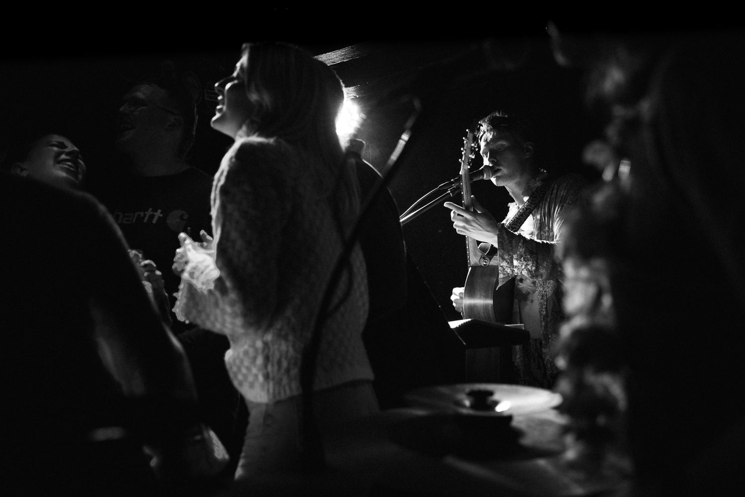 Ecstatic audience enjoying Jude Johnson's live intimate gig at The Castle Inn, St Ives, Cornwall. ©Toni Edwards, 2023