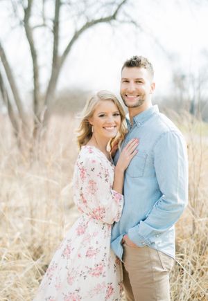 Light and airy film lakeside dock engagement session at Gray's Lake in Des Moines, Iowa