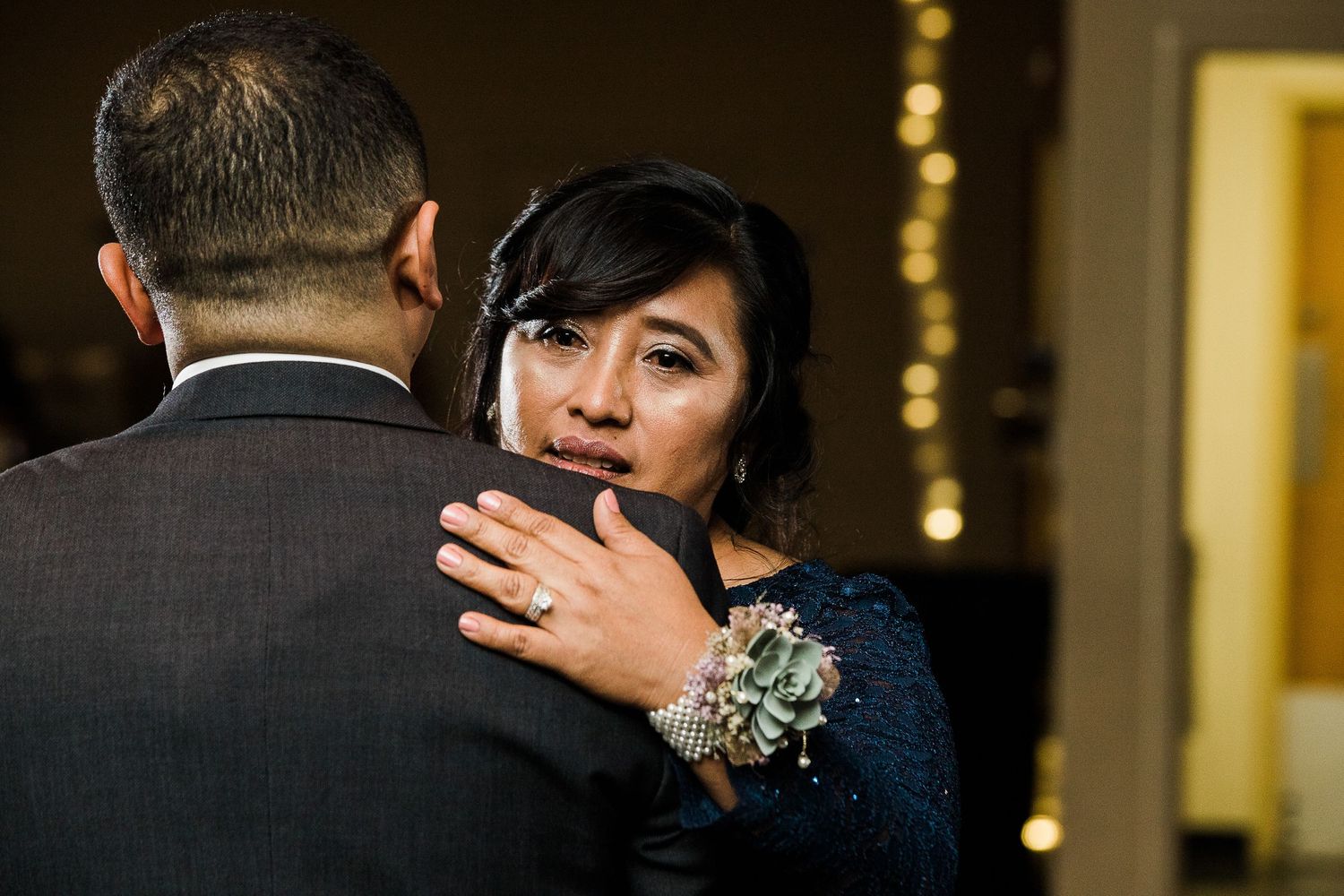Groom and stepmother at wedding parent dance