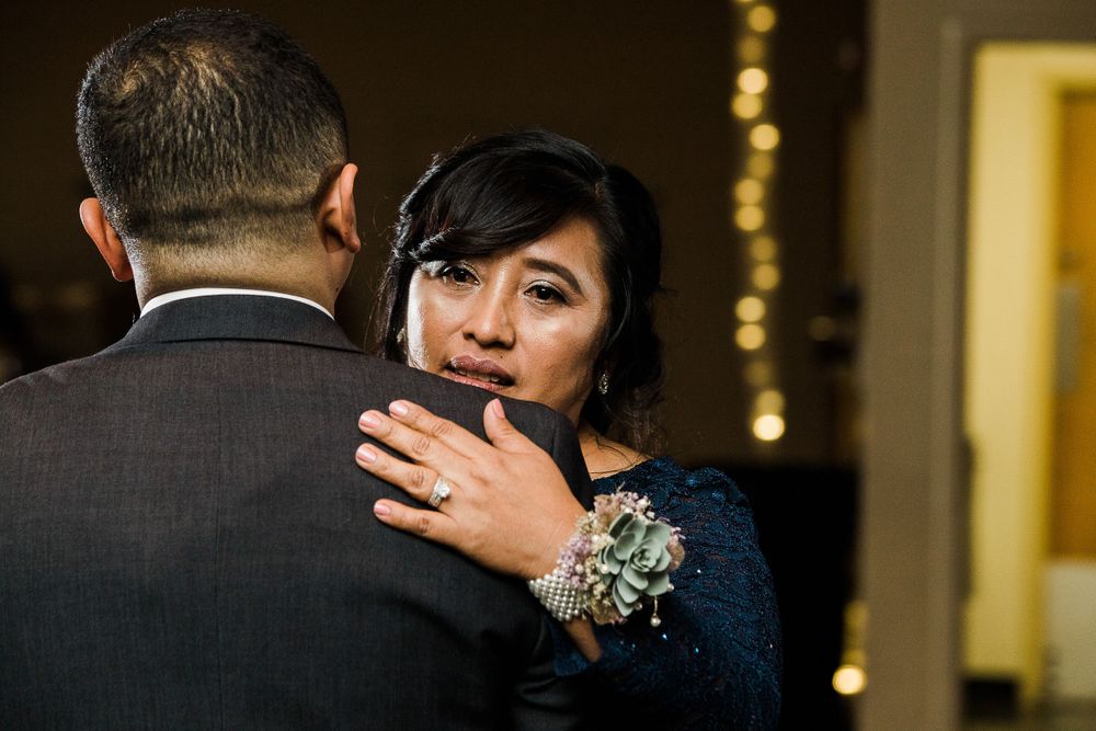 Groom and stepmother at wedding parent dance