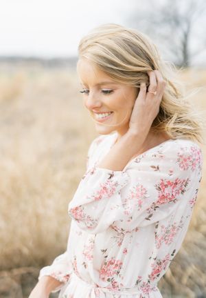 Light and airy film lakeside dock engagement session at Gray's Lake in Des Moines, Iowa