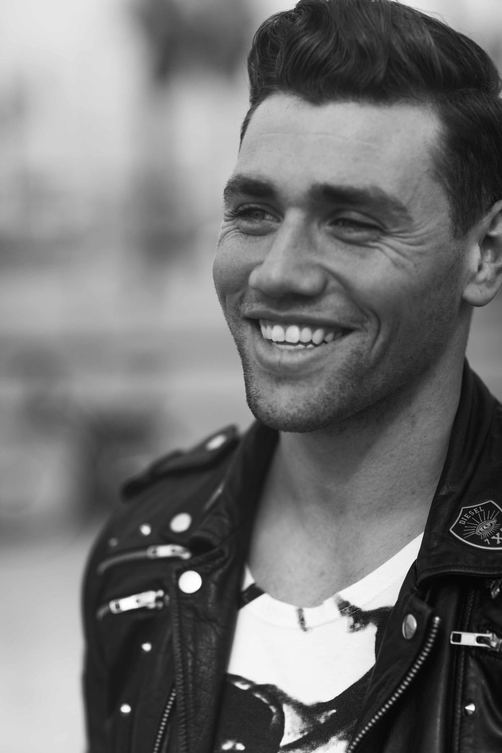 Actor Christian James Diesel Leather Biker Jacket Converse Venice Skate Park California James Dean Candid Laughter Smile