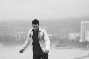 Actor Christian James Levi's Denim Trucker Jacket Jeans Sand Venice Beach Overcast