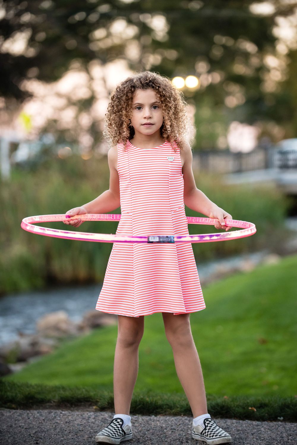 female child model with hula hoop