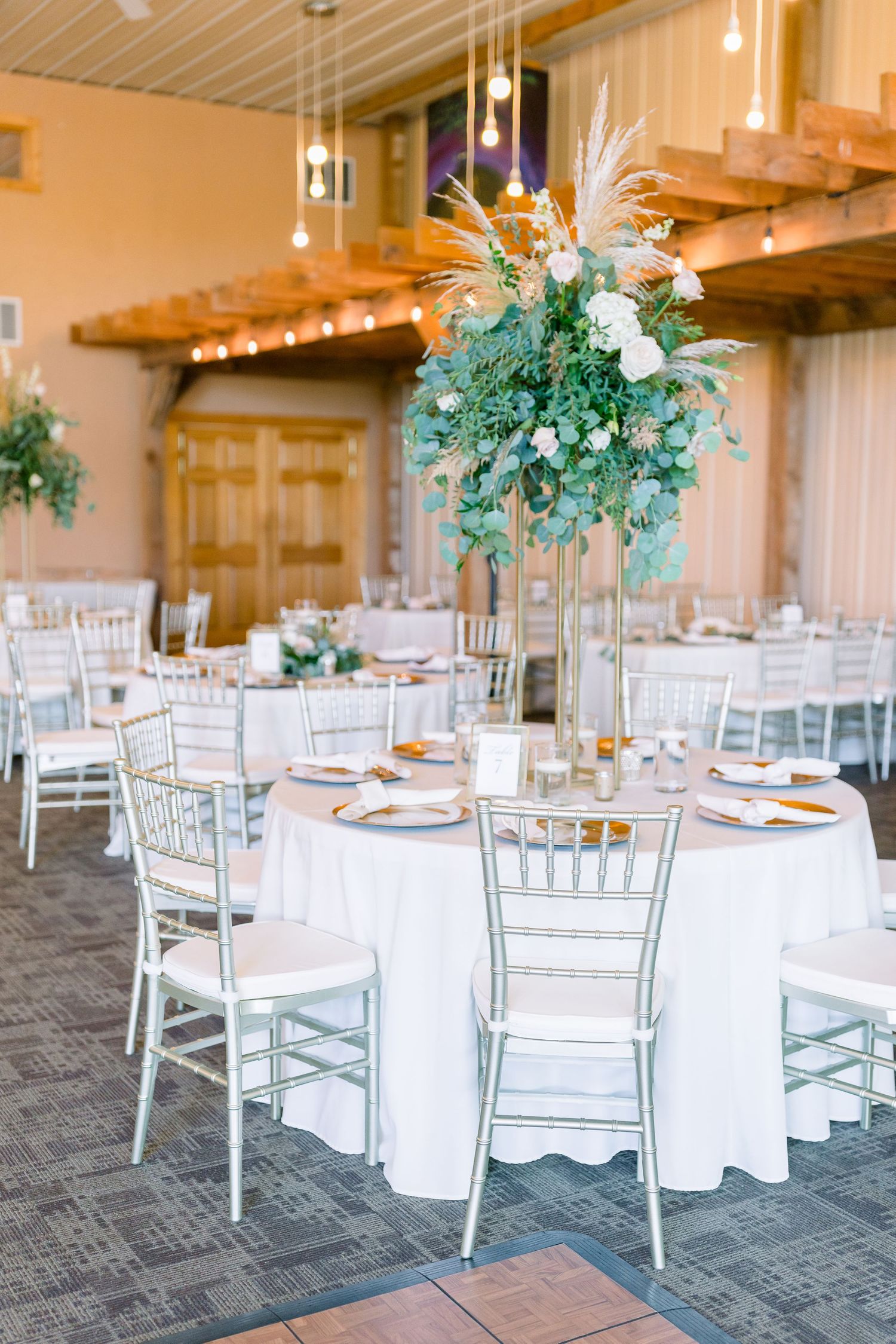 Vineyard photos with white willow events at Prairie Moon Winery wedding in Ames, Iowa