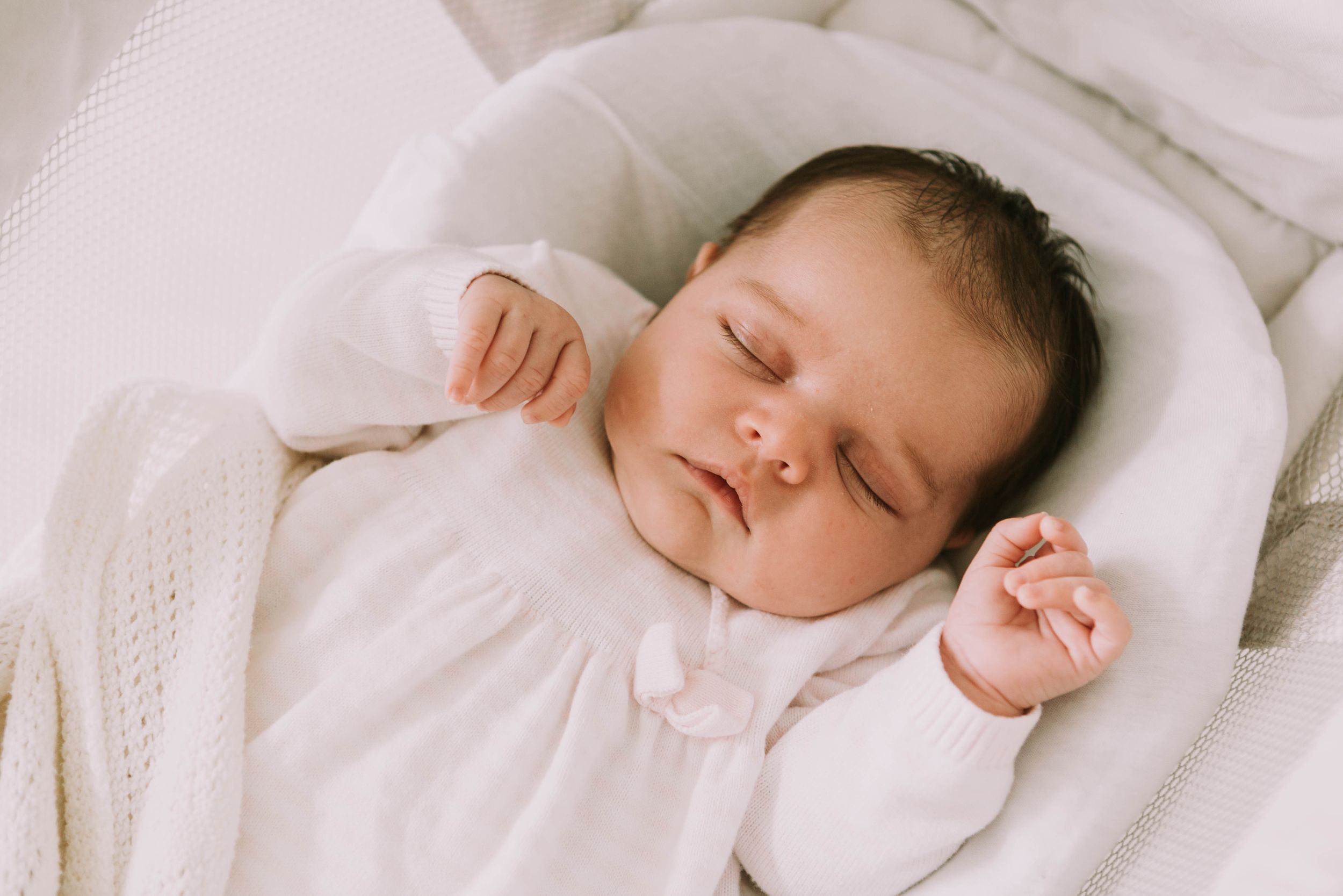 sleeping newborn baby girl at home in Hornchurch
