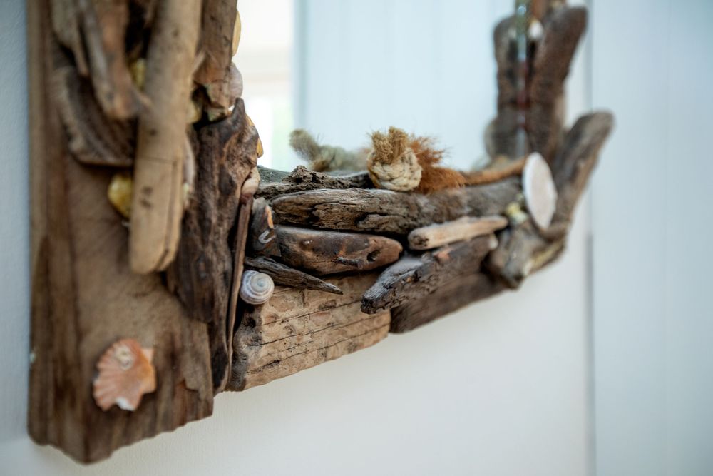 Close up image showing the detail in as driftwood mirror frame.