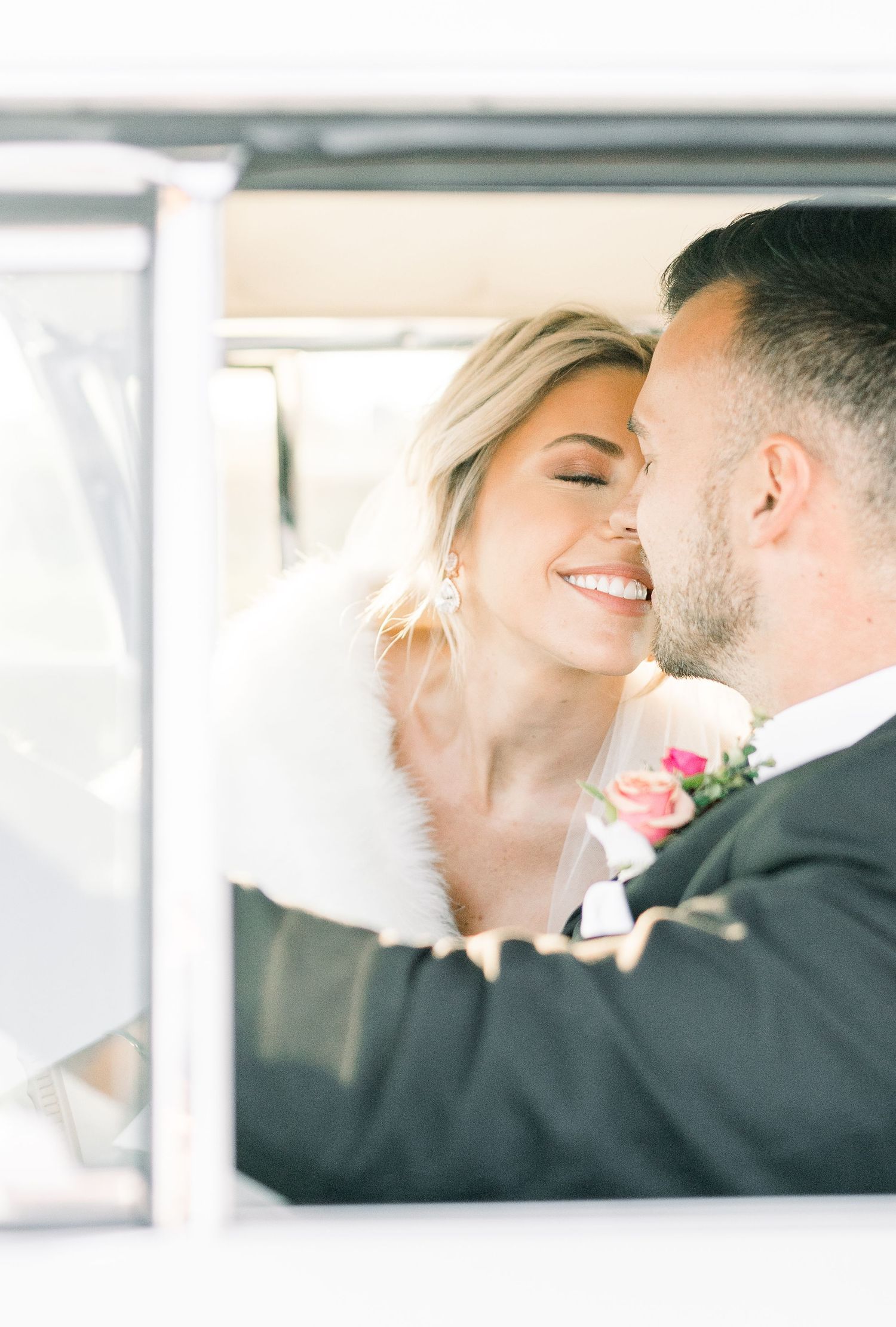 winter wedding at 1868 Farmhouse Wedding in Boone, Iowa with Modern Dress bridal gown