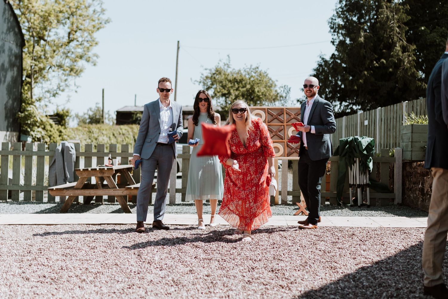 Wedding guest play outdoor games during drinks reception