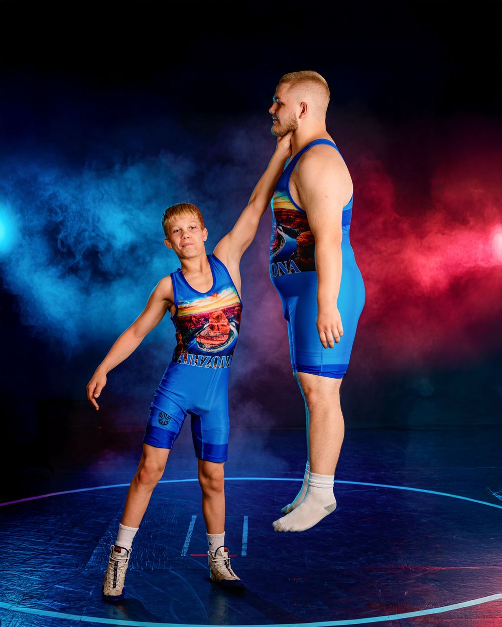 Media day portrait of Arizona youth wrestlers ahead of national competition, fun, smoke and lights