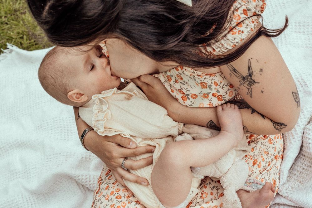 Mother breastfeeding baby