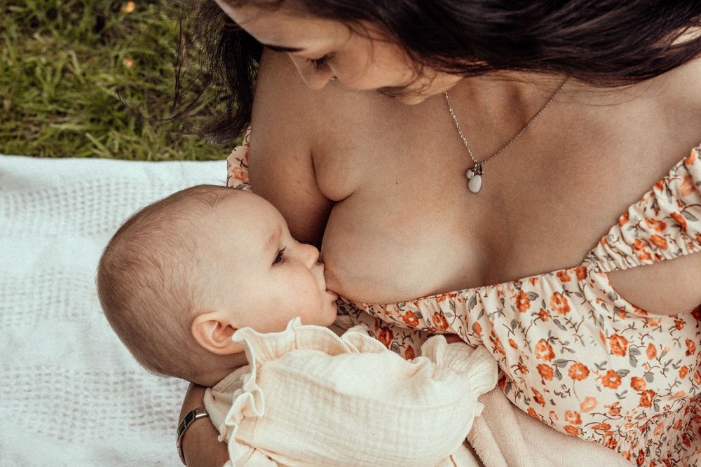Mother breastfeeding baby