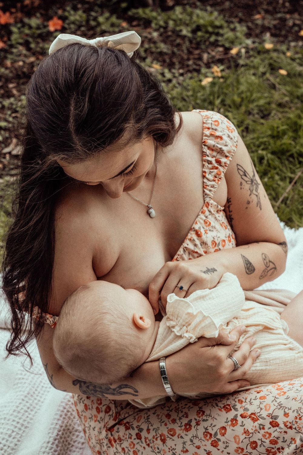 Mother breastfeeding baby