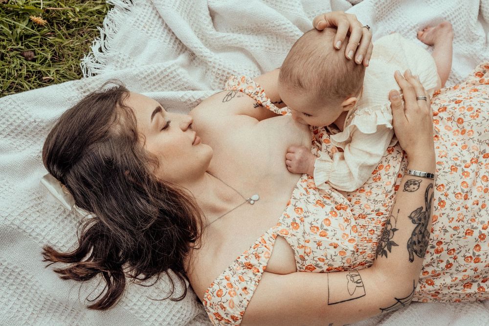 Mother breastfeeding baby