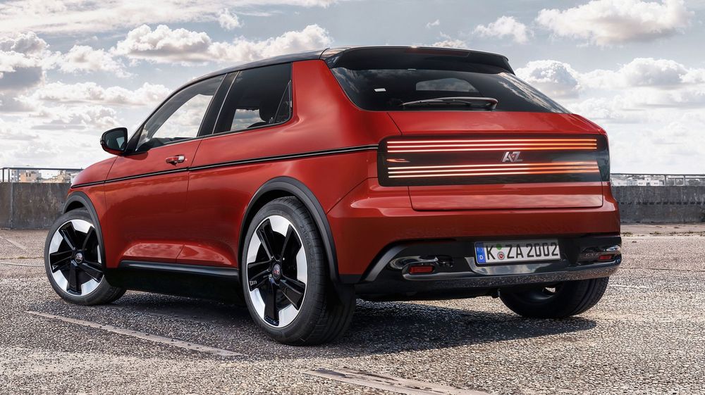 Sleek red Polestar electric SUV concept car shown from rear three-quarter view against cloudy sky backdrop.