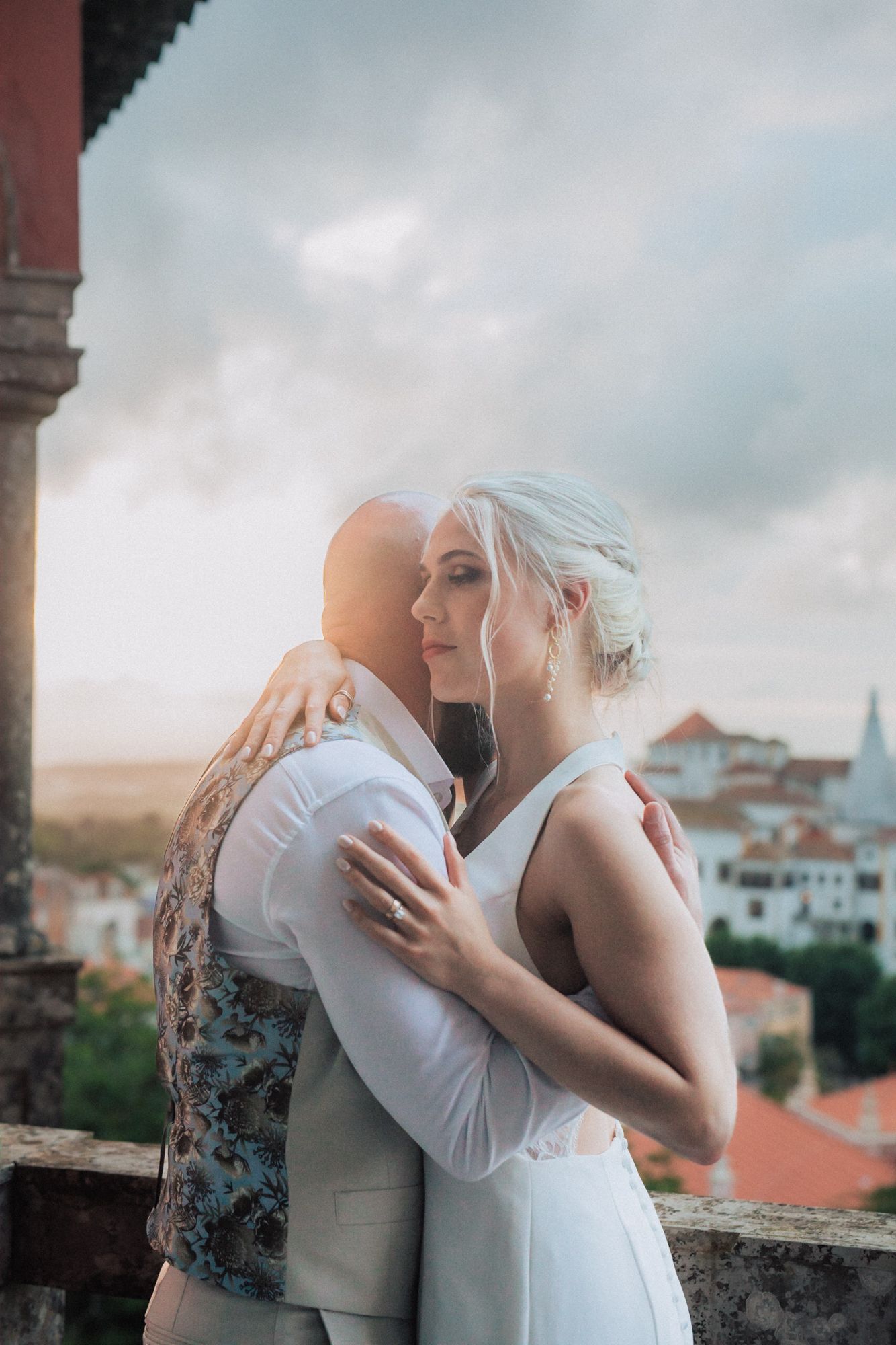 Bride & groom at Casa dos Penedos, a wedding venue from Penha Longa Catering. A romantic moment captured by a Portugal wedding photographer.