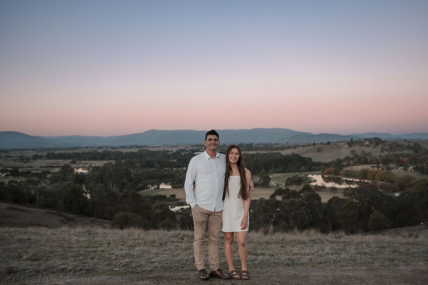A series of panoramic sunset views over hills and landscapes with natural light and mountain silhouettes in the distance.