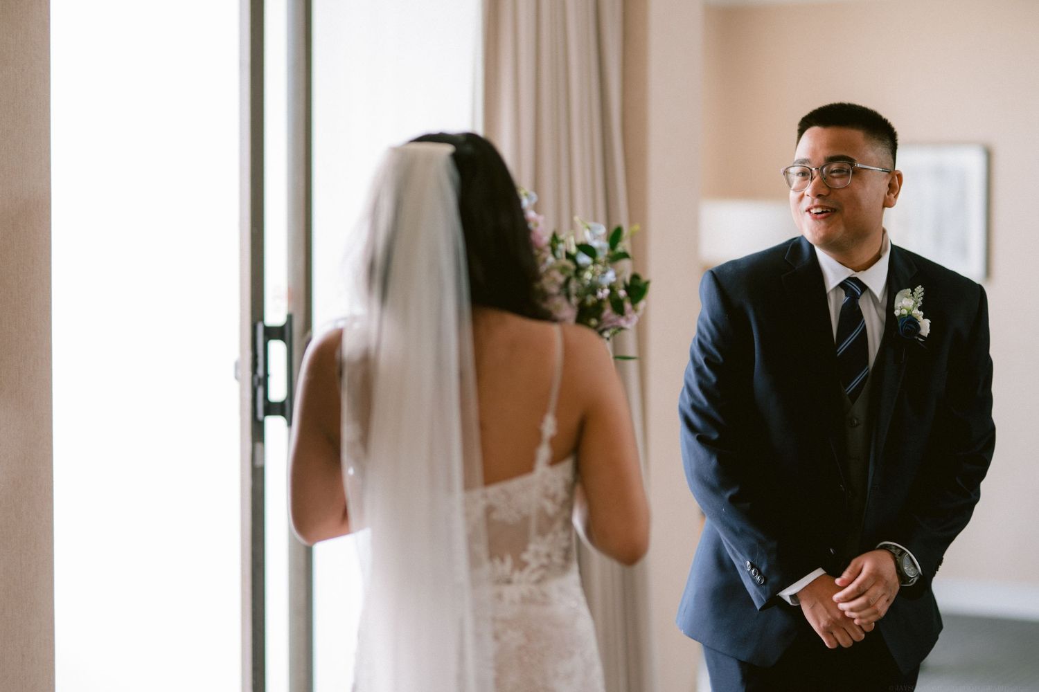 Intimate first look moment between couple before their wedding ceremony.