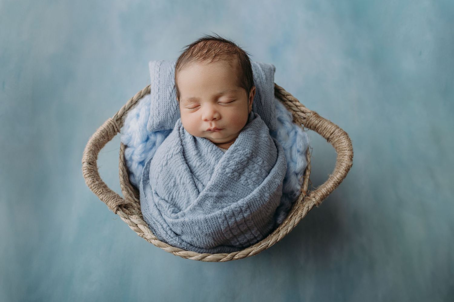twin baby boy in blue setup in tampa