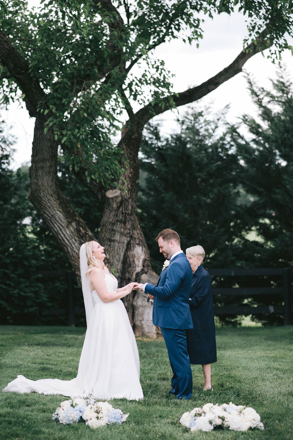 Bride and groom sharing a fun moment during the ceremony