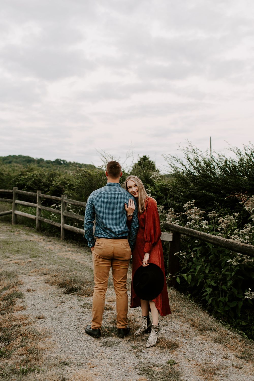 woman holding on to her man during Nashville Tennessee engagement
