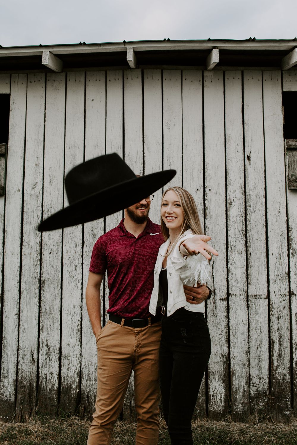 woman tossing a hat during her Nashville engagement session