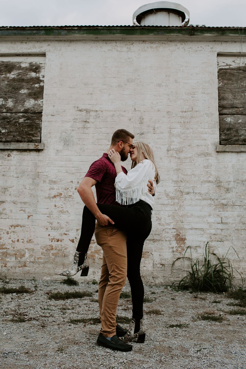 couple embracing and kissing during Tennessee couples session