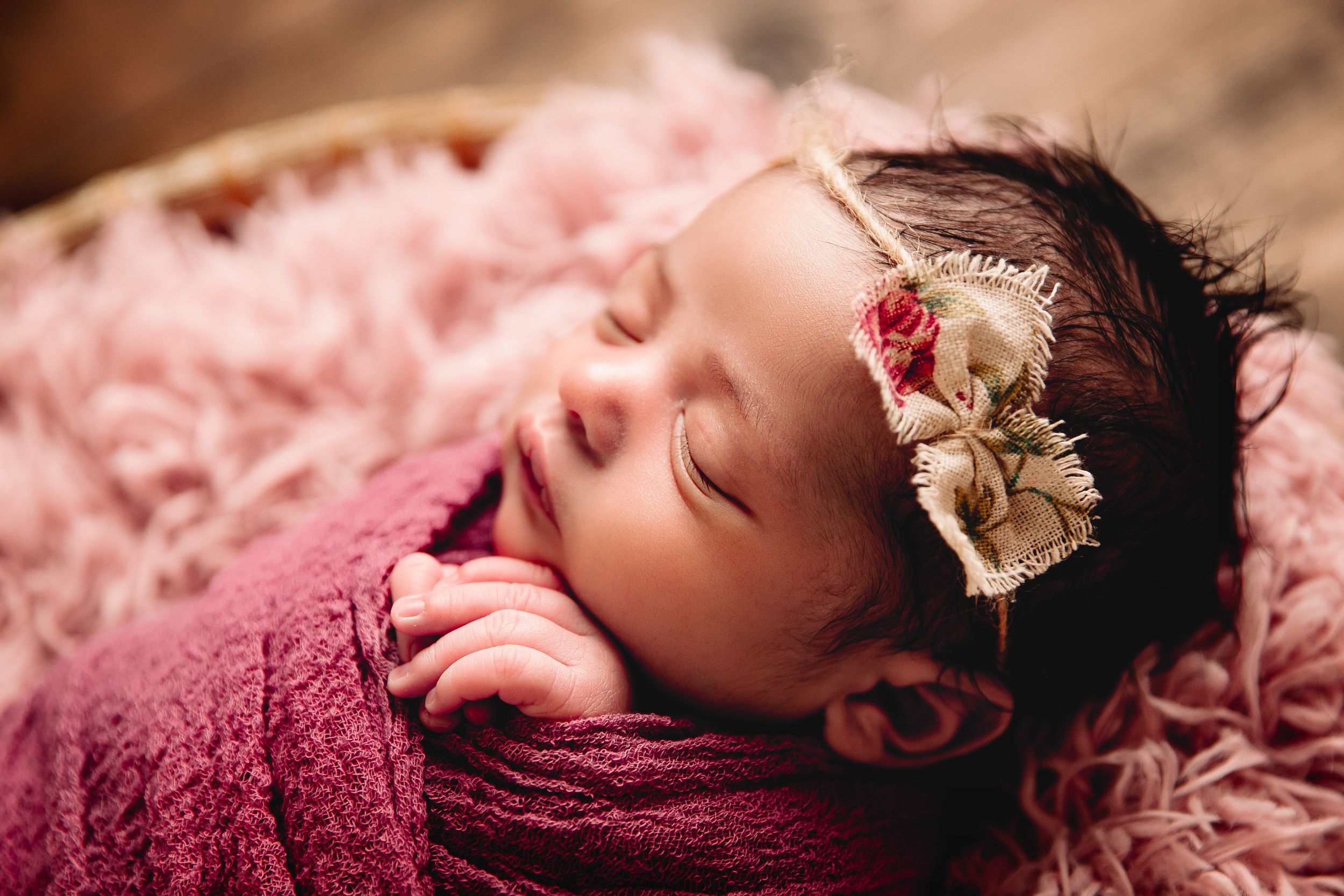 close up profile of newborn girl