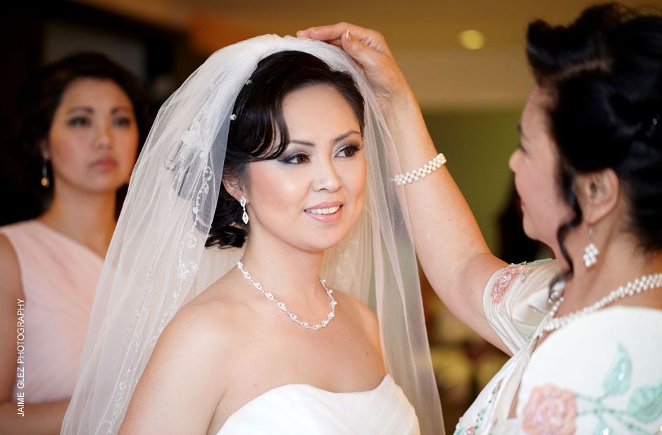mother giving bride her blessing