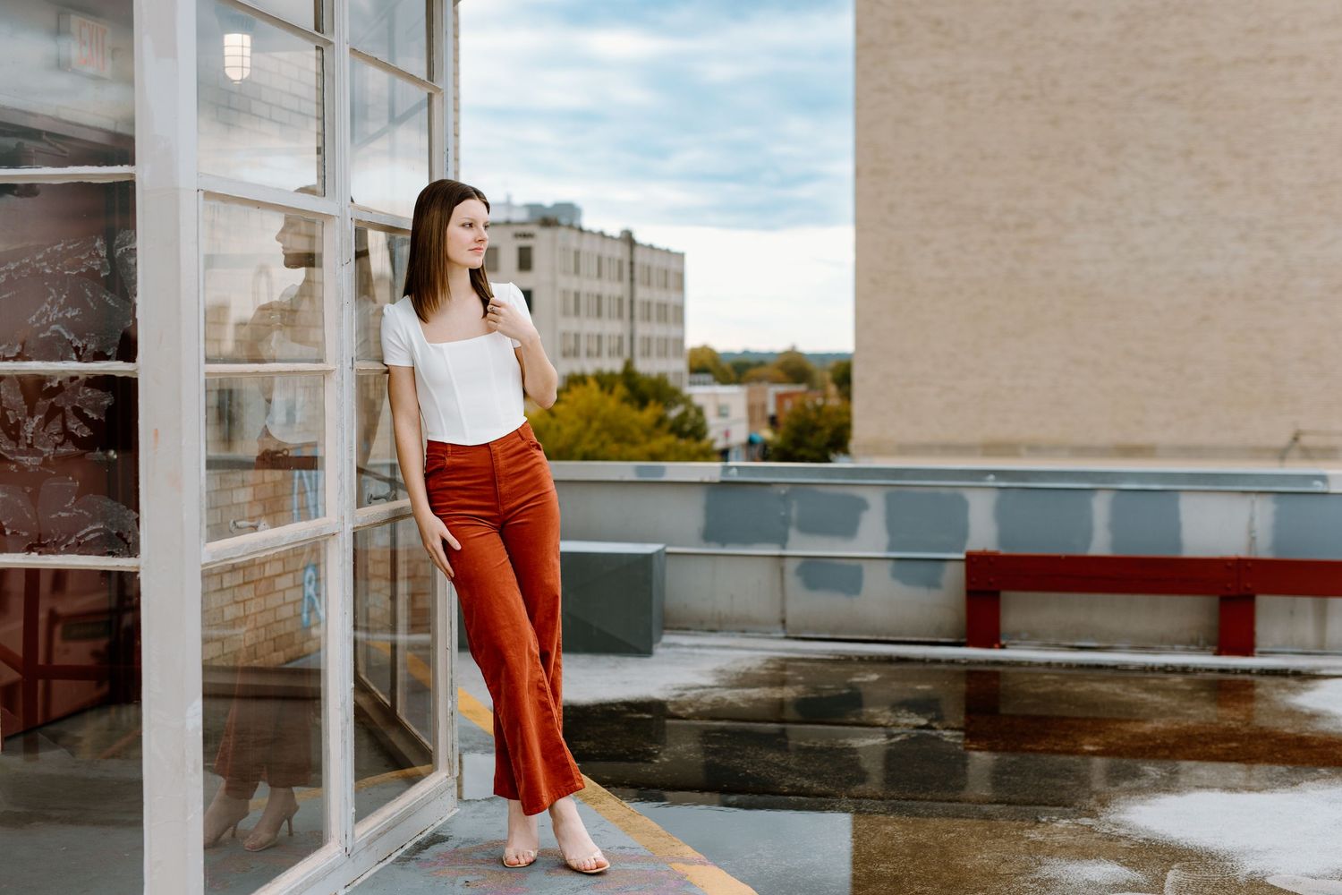 senior portraits- fun senior poses- senior outfit- rooftop senior picture- professional pictures