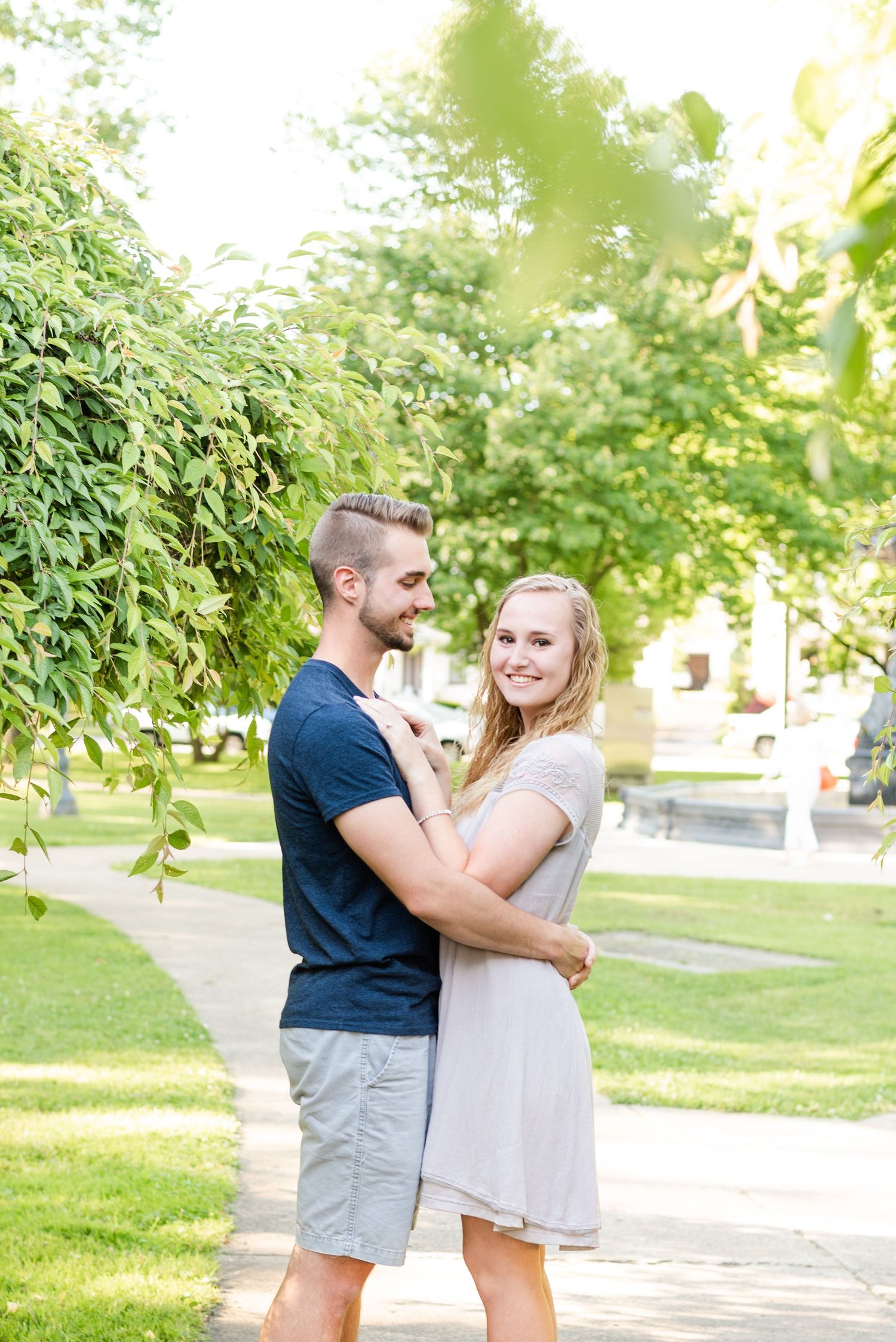 Couple holding each other for engagement in Franklin Pennsylvania