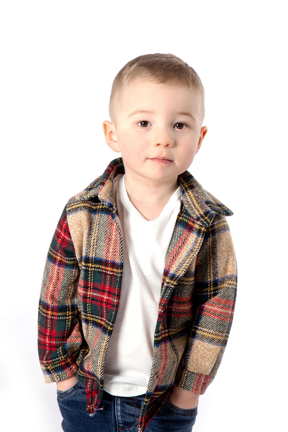 toddler wearing check shirt with hands in pocket