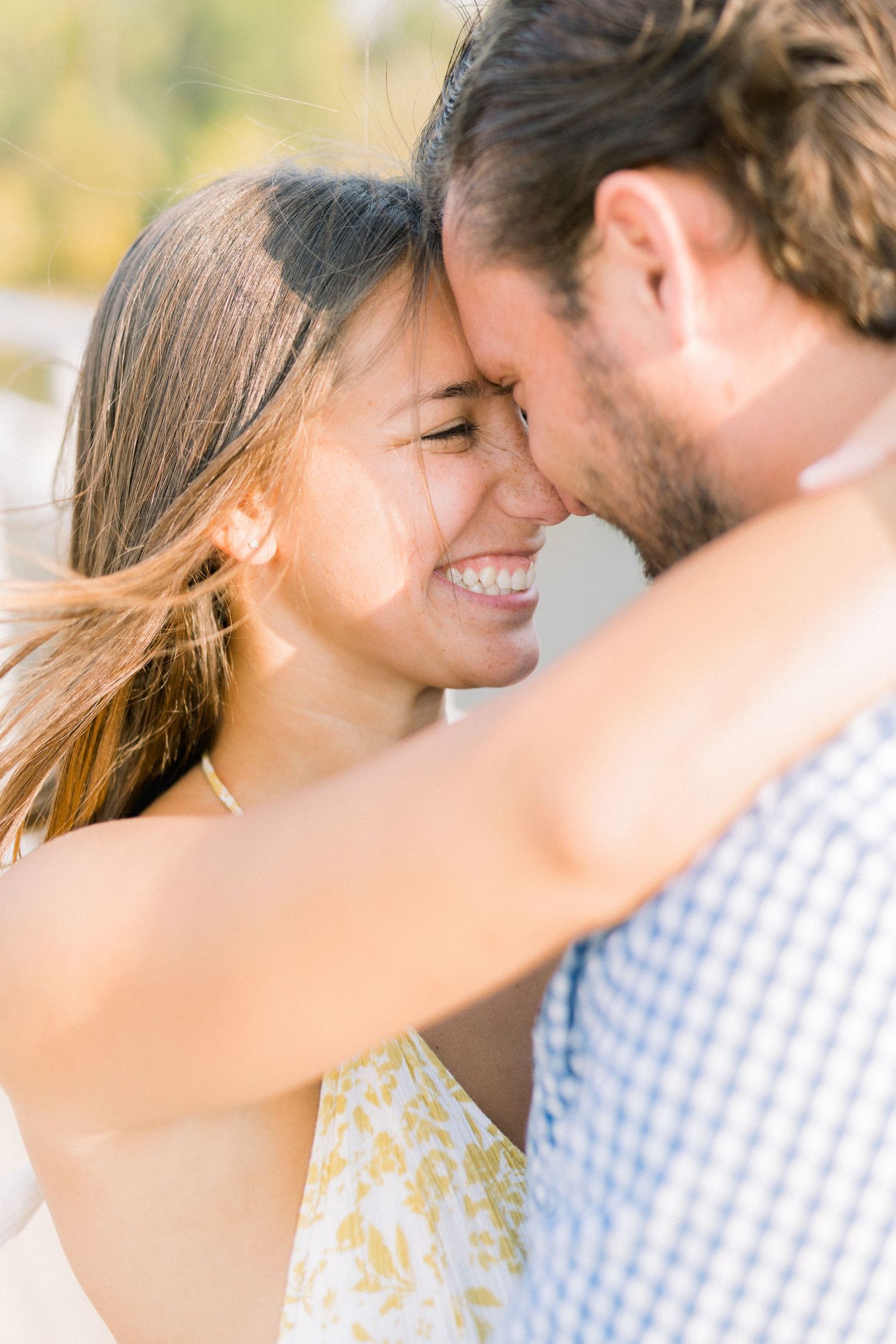 Des Moines Engagement photos at Grays Lake in downtown Des Moines, Iowa with light and airy photographer Nicole Laing