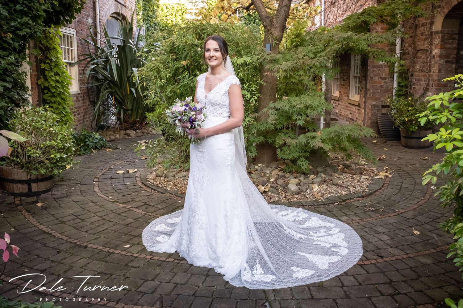 Bride standing on her own at The York Pavilion Hotel