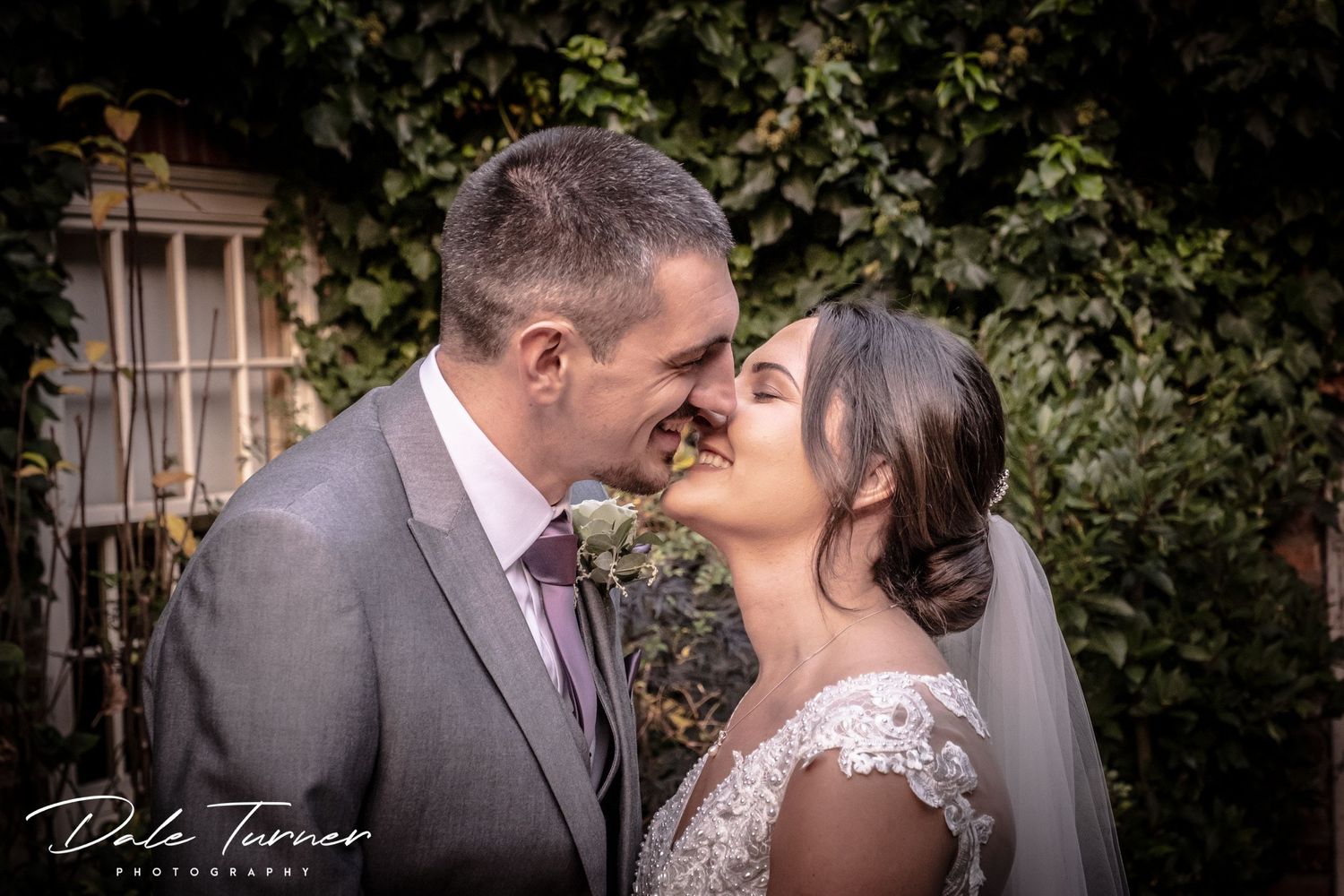 Bride and groom kissing at The York Pavilion Hotel