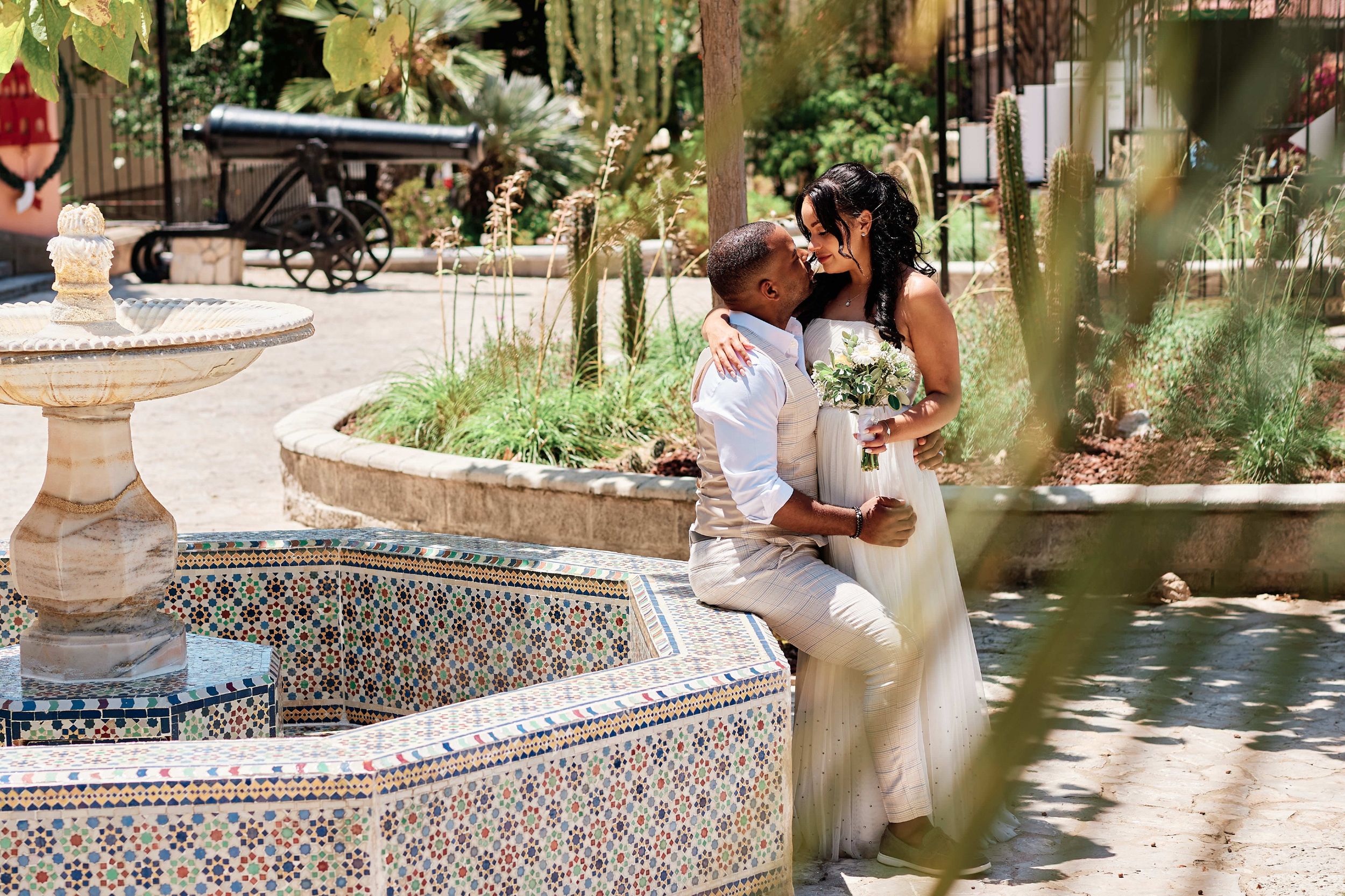 Groom and bride in Alameda Gardens in Gibraltar
