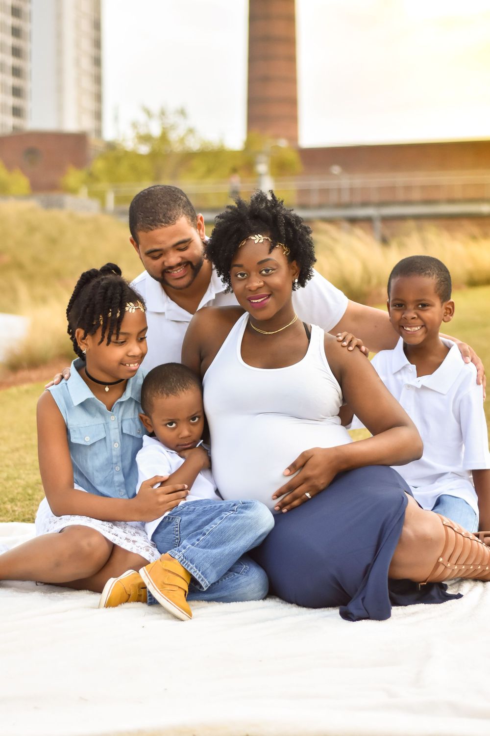Expectant mom pose with family+ Family of five+ black family pose for photo + Railroad park