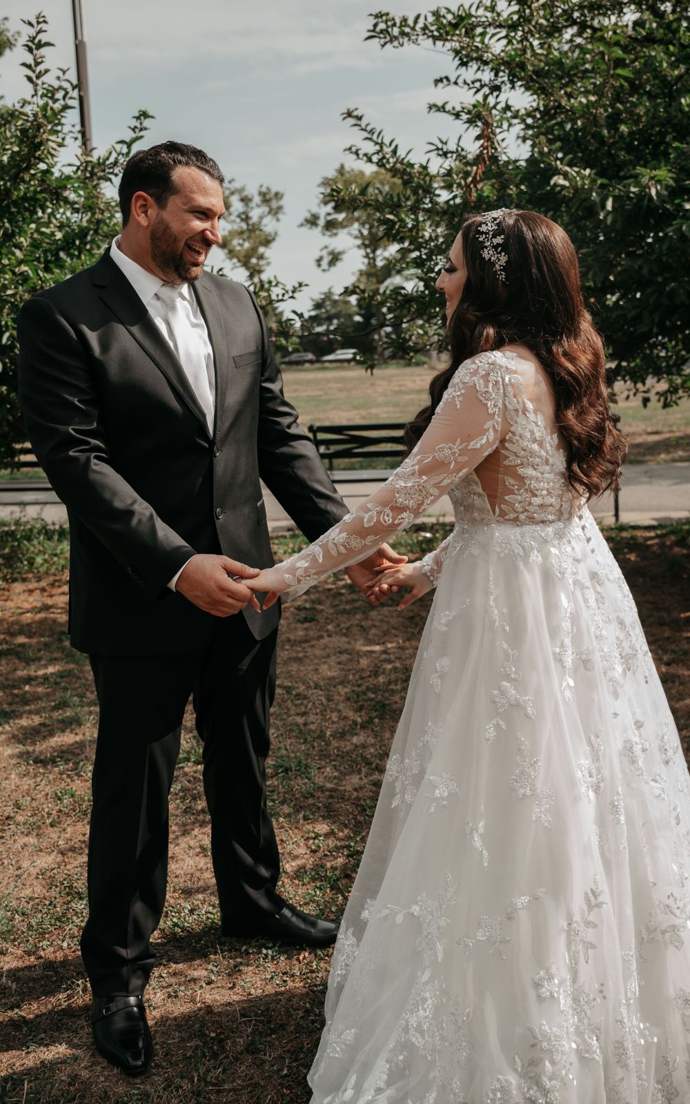 Groom admiring his bride at the first look