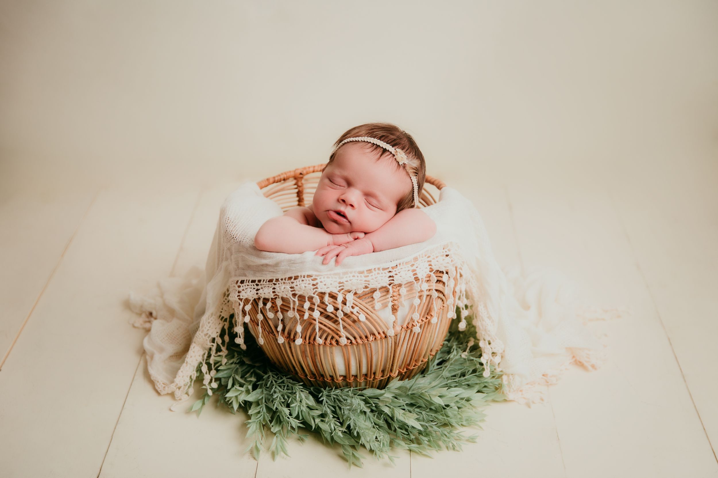 kansas city newborn photography baby girl in boho basket sleeping