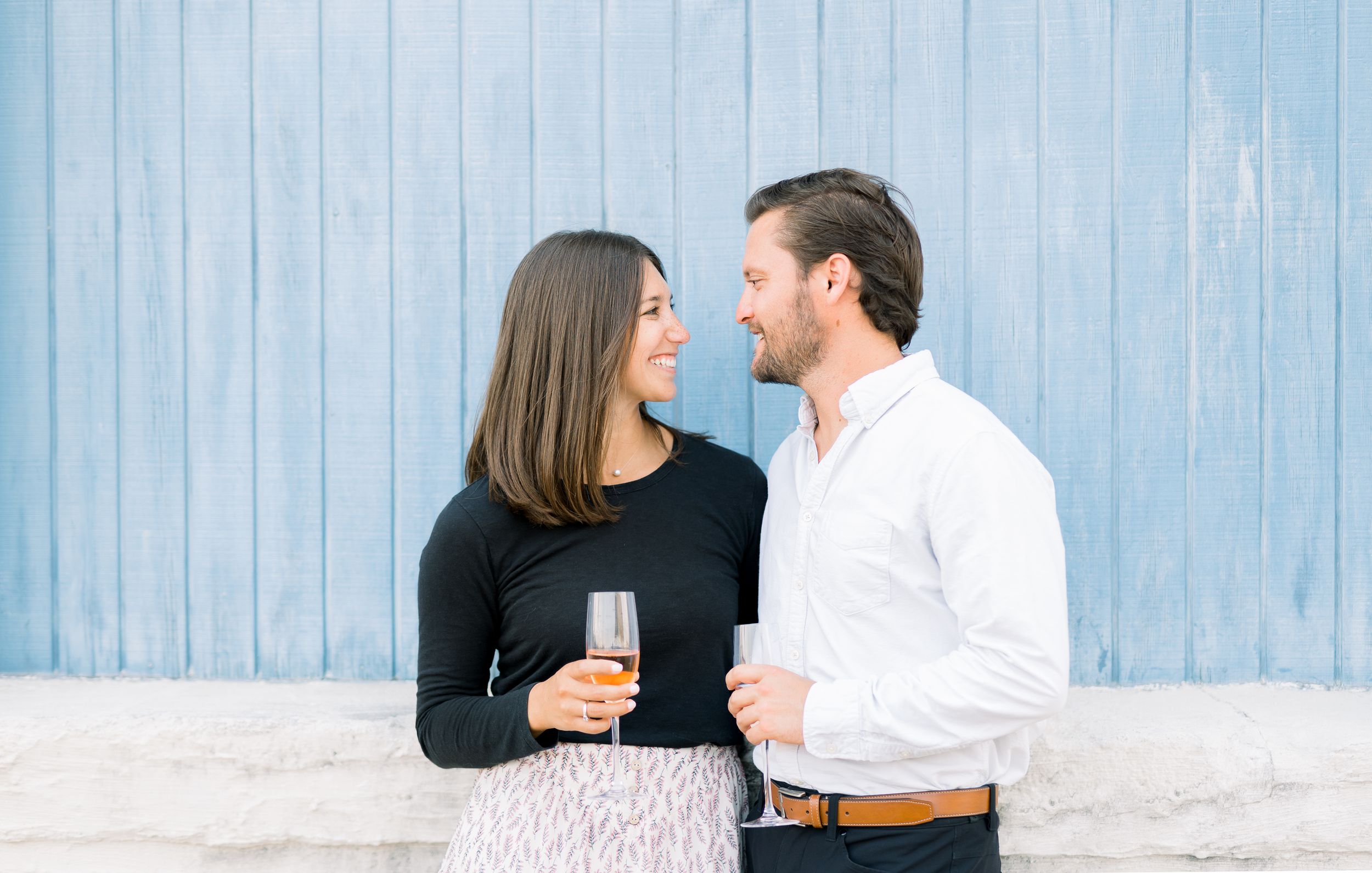 Des Moines Engagement photos in downtown Des Moines, Iowa with light and airy photographer Nicole Laing