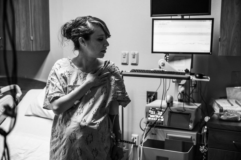 expectant mom labors standing up at a local hospital in Northwest Arkansas