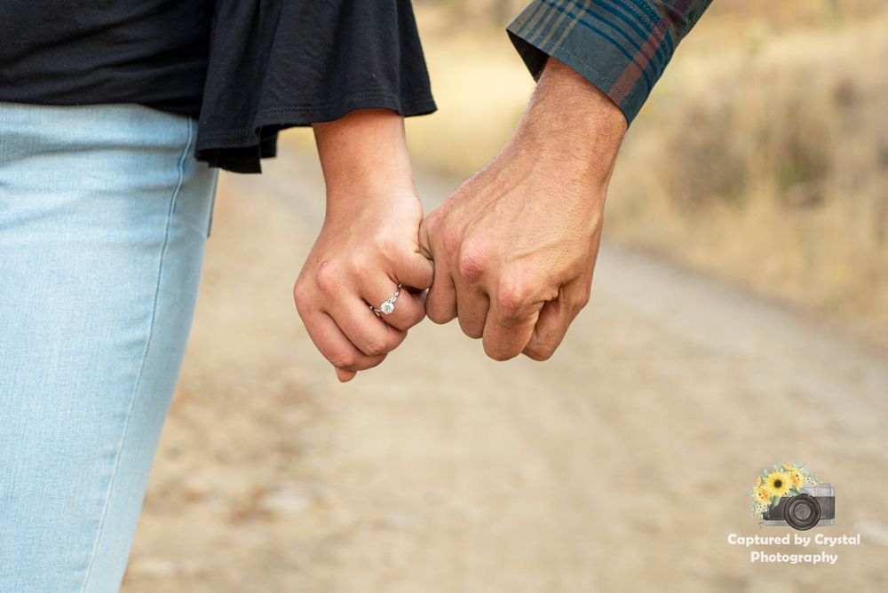An engaged couple pose for their engagement photoshoot in Ellensburg, Washington.