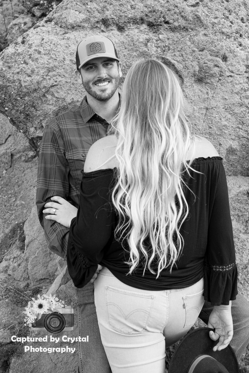 An engaged couple pose for their engagement photoshoot in Ellensburg, Washington.