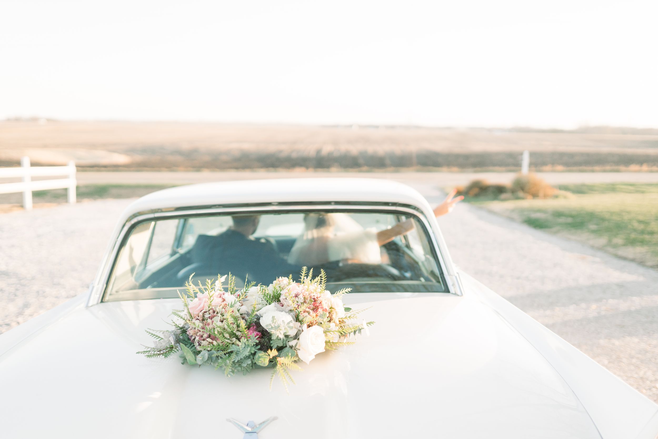 winter wedding at 1868 Farmhouse Wedding in Boone, Iowa with Modern Dress bridal gown