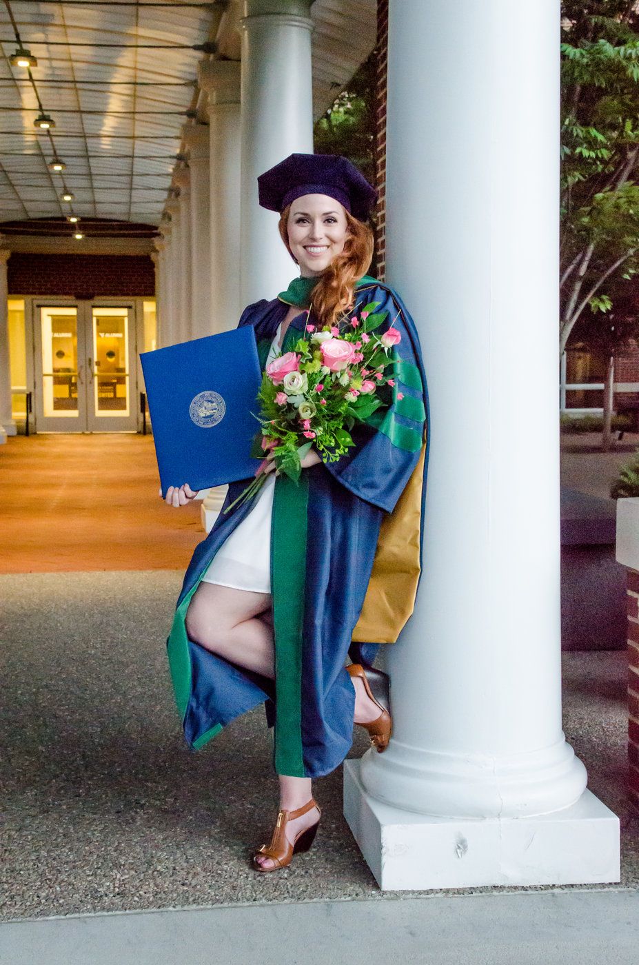 Medical Student Graduation Portrait in front of Erickson Alumni Center; photo by Morgantown Photographer Laura Priestley