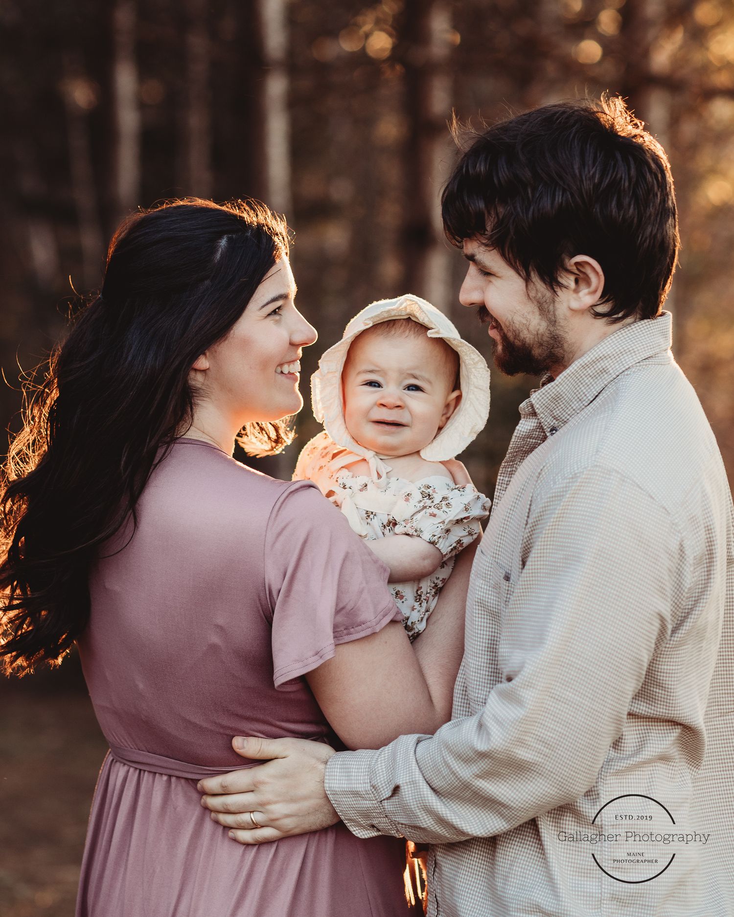 Professional newborn photo with mom and dad