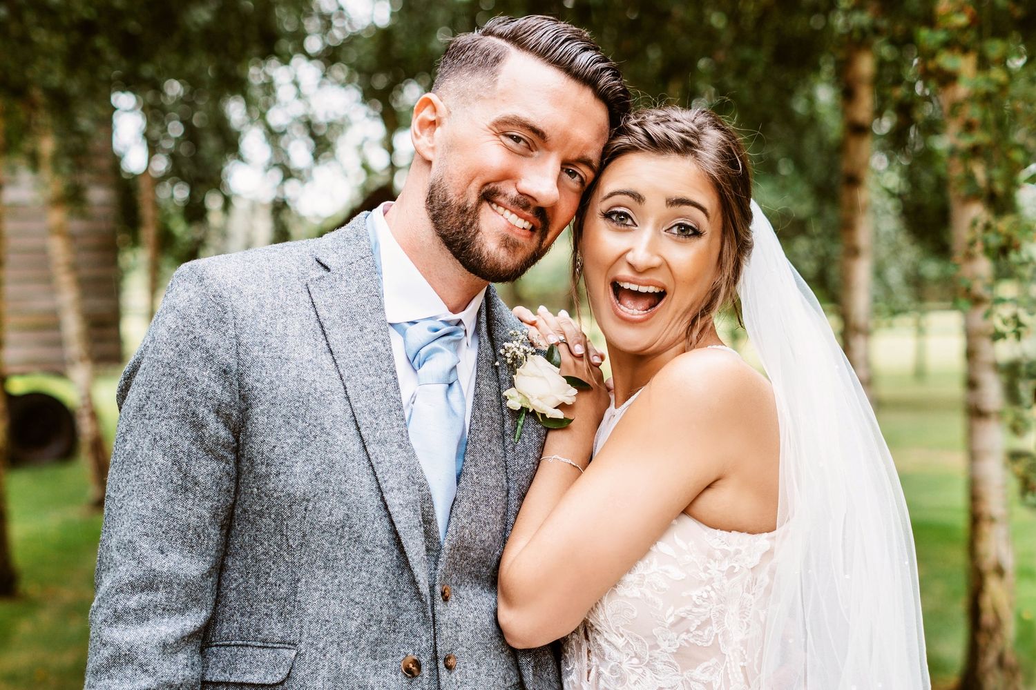 great fun and very good looking bride and groom smiling