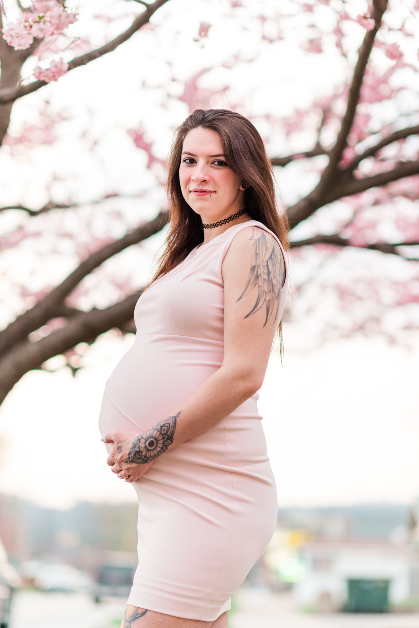 Maternity photos with tattoo sleeve with cherry blossom tree in Kittanning, Pennsylvania