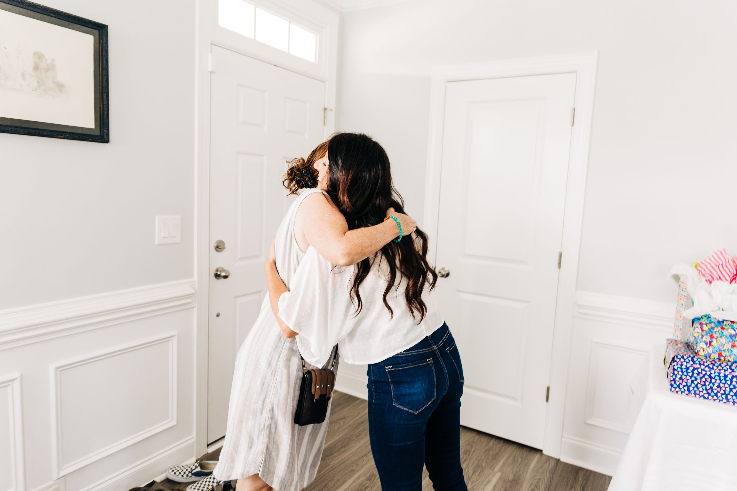 Two women hugging in greeting